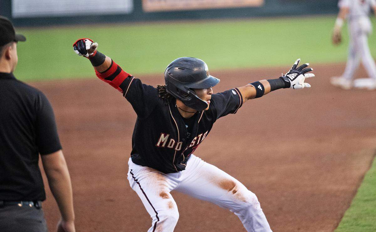 Modesto Nuts’ Tai Peete celebrates a RBI triple in the first inning of the California League North Division series with the San Jose Giants at John Thurman Field in Modesto, Calif., Thursday, Sept. 12, 2024.