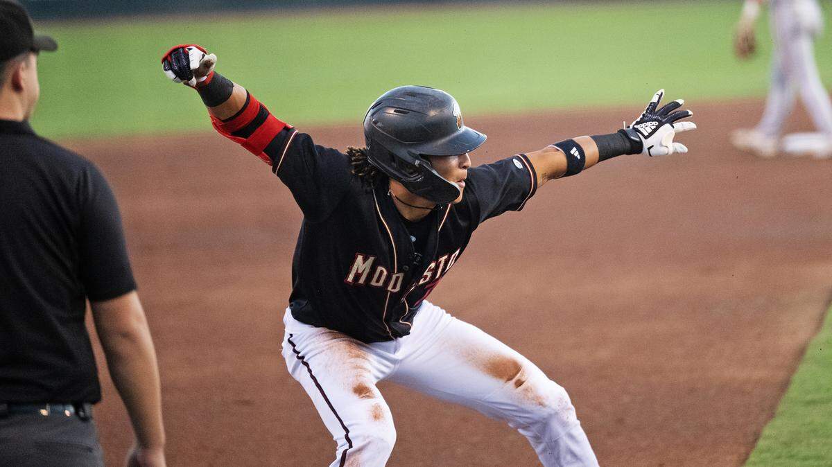 The Modesto Nuts’ Tai Peete celebrates a RBI triple in the first inning of the California League North Division series with the San Jose Giants at John Thurman Field in Modesto, Calif., Thursday, Sept. 12, 2024.