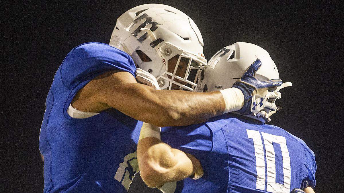 Modesto Junior College players celebrate during victory in 2019.