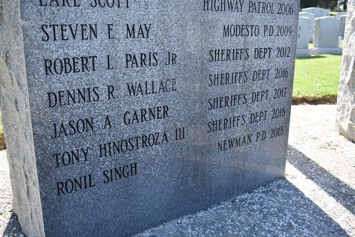 Two names join the marker at the 2019 Stanislaus County Peace Officers Memorial service on Wednesday, May 1, at Lakewood Memorial Park in Hughson, CA. Stanislaus County Sheriff’s Department Deputy Tony Hinostroza III was killed in a car crash near Riverbank in November. Newman police Cpl. Ronil Singh was fatally shot during a traffic stop the day after Christmas.