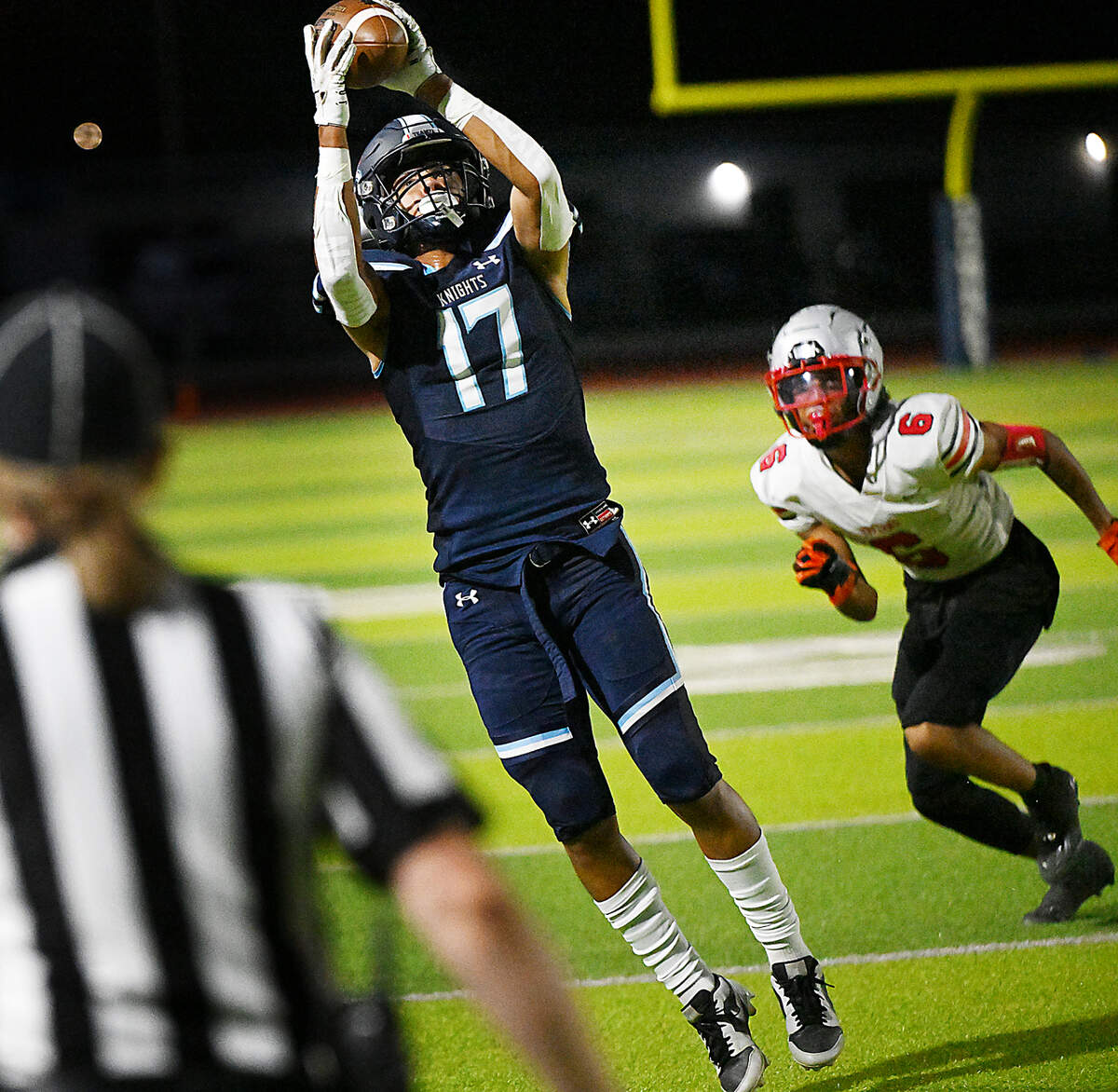 Downey’s Jayceon Sloan makes a catch along the sideline during the game with Lincoln at Downey High School in Modesto, Calif., Friday, August 18, 2023.