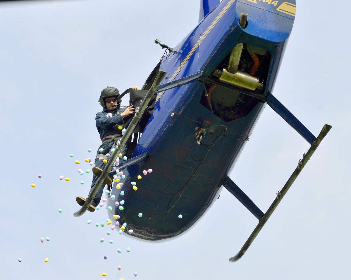 Easter Eggs being dropped from a helicopter during the 2018 Eggstravganza easter egg hunt at Shelter Cove Community Church in Modesto.