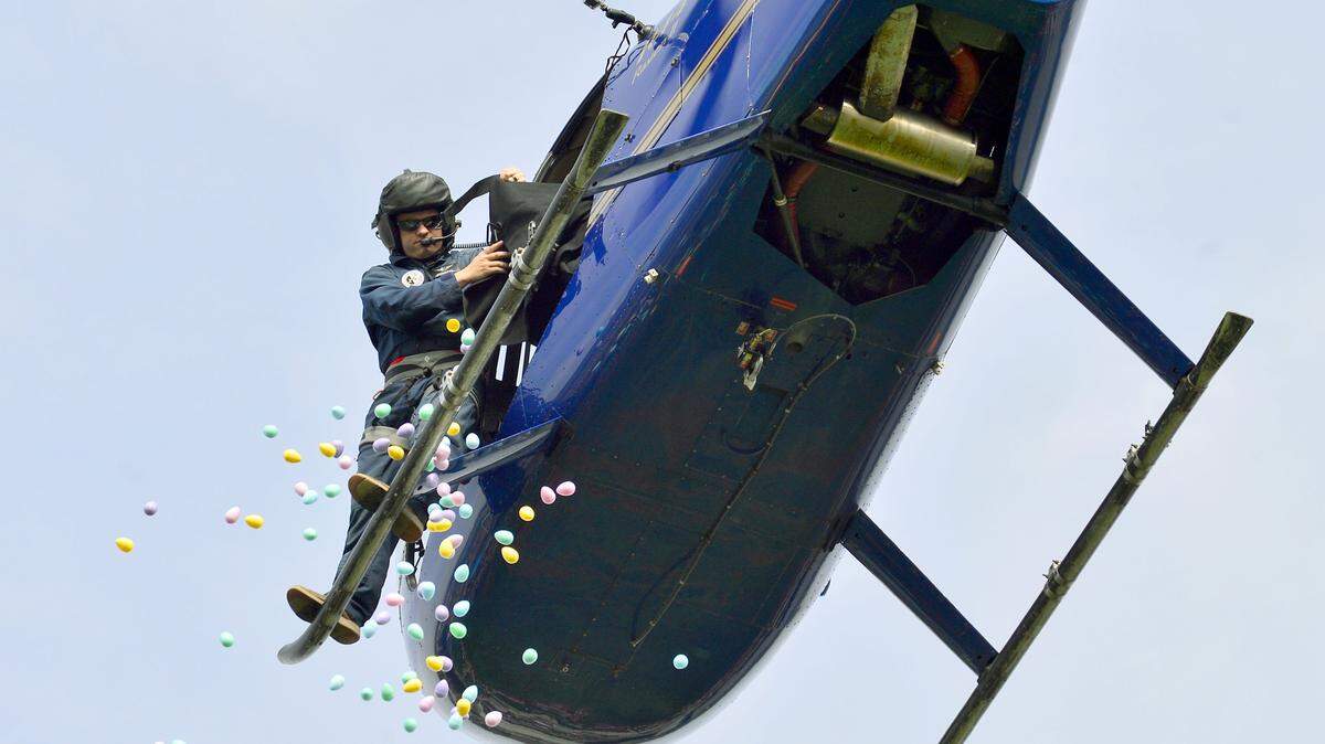 Easter Eggs being dropped from a helicopter during the 2018 Eggstravganza easter egg hunt at Shelter Cove Community Church in Modesto.