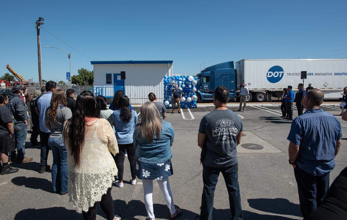 Matt Holt, Dot Foods vice president of human resources talks to employees as the company unveiled a health clinic at its Modesto warehouse in Modesto, Calif., on Wednesday, May 4, 2022. The clinic will provide basic health care for its 400 employees and their families.