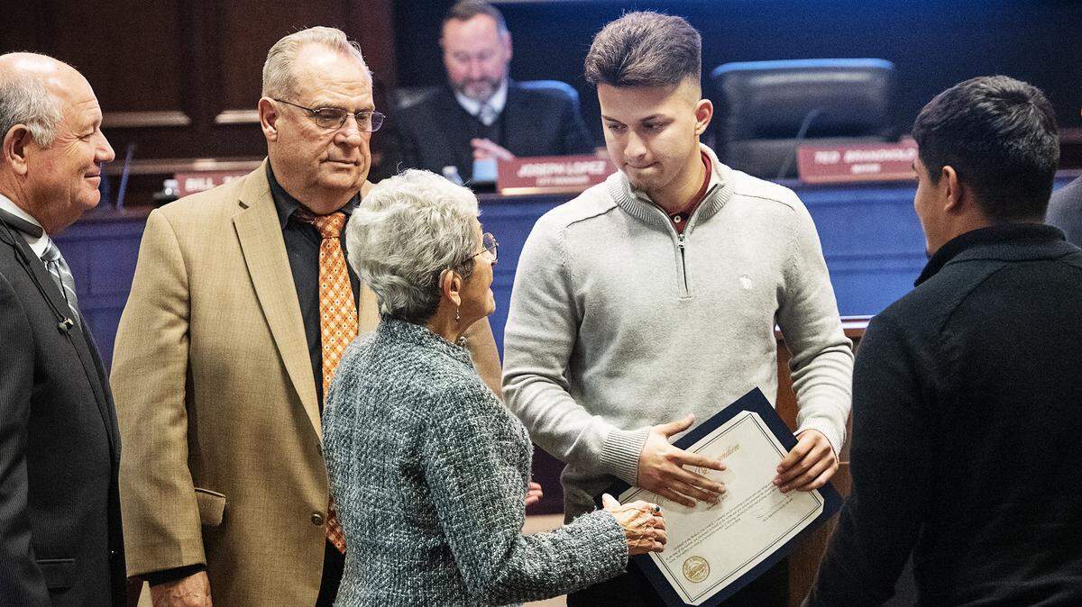 The Modesto City Council members Jenny Kenoyer, Bill Zoslocki and Doug Ridenour recognize Alex Farias, left, and Rodolfo Galarza, right, for stopping a violent attack in downtown Modesto in November. Photographed during the city council meeting in Modesto, Calif., Tuesday, Dec. 3, 2019.