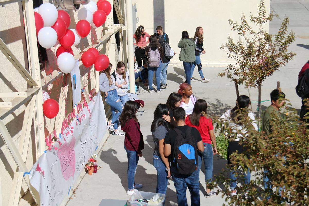 At Turlock High School on Tuesday, Oct. 22, 2019, students mourn the death of their classmate Estevan Nuno, who stopped breathing while drinking with friends in Crane Park the night before.