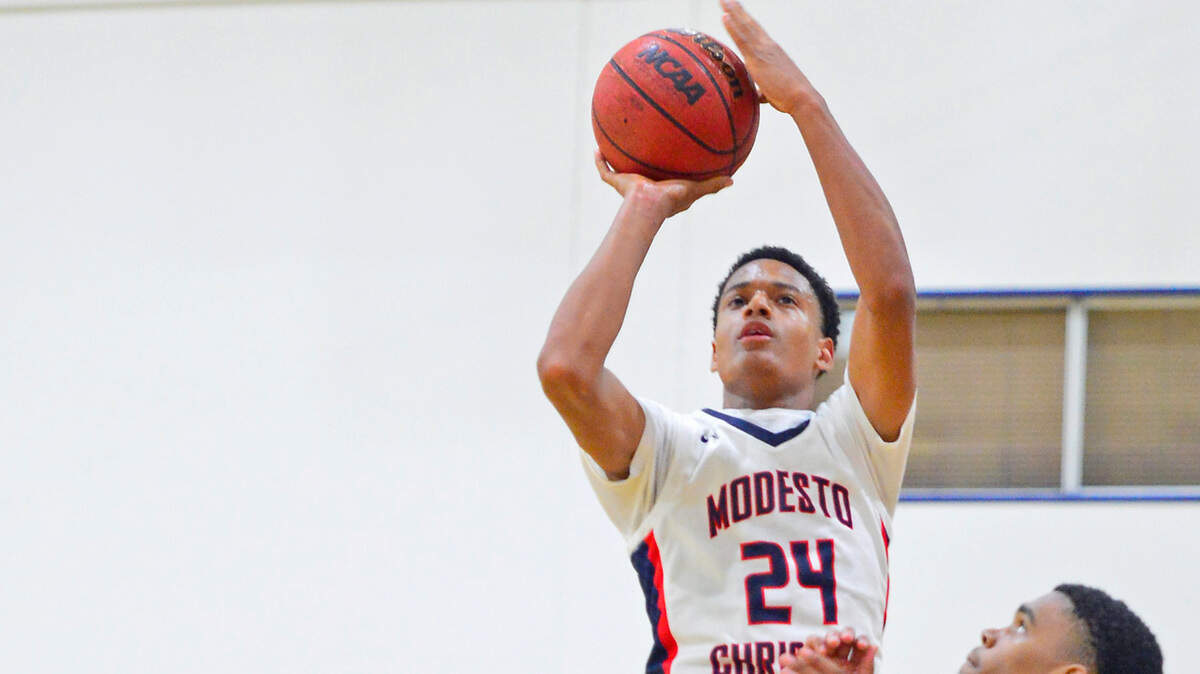 Modesto Christian guard Jamari Phillips (24) take a shot during a game between Modesto Christian and Sheldon High School at Modesto Christian in Modesto California on May 3, 2021.