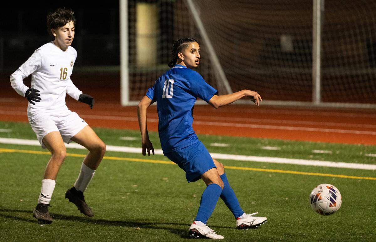 Turlock’s Sebastian Carbajal passes the ball during the Central California Athletic League game with Enochs at Turlock High School in Turlock, Calif., Wednesday, Jan. 24, 2024.