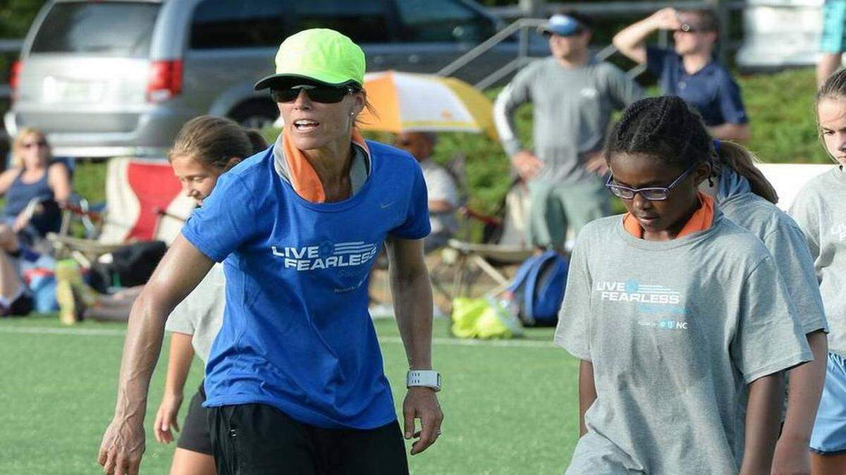 World Cup star Tisha Venturini Hoch on left, instructs soccer players during the youth soccer clinic held at Bailey Road Soccer Park in Cornelius June 23,2015. ROBERT LAHSER RLAHSER@CHARLOTTEOBSERVER.COM