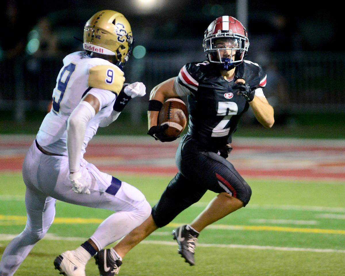 Patterson receiver Noah Cozart (2) runs after catching a pass in the flat during a game between Central Catholic High School and Patterson High School at Patterson High School in Patterson California on September 9, 2024. Central Catholic won the game 25-14