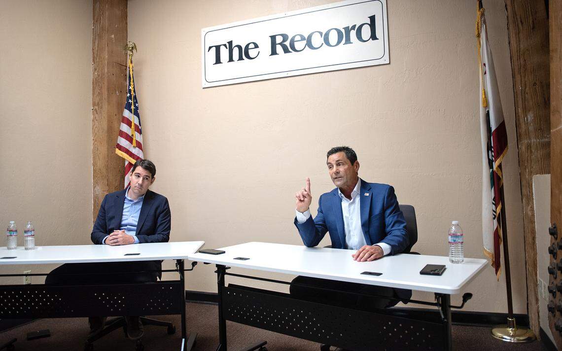U.S.Congressional District 9 candidate Tom Patti speaks during a debate with Josh Harder, left, at the Stockton Record newspaper office in Stockton, Calif., Thursday, Oct. 13, 2022.