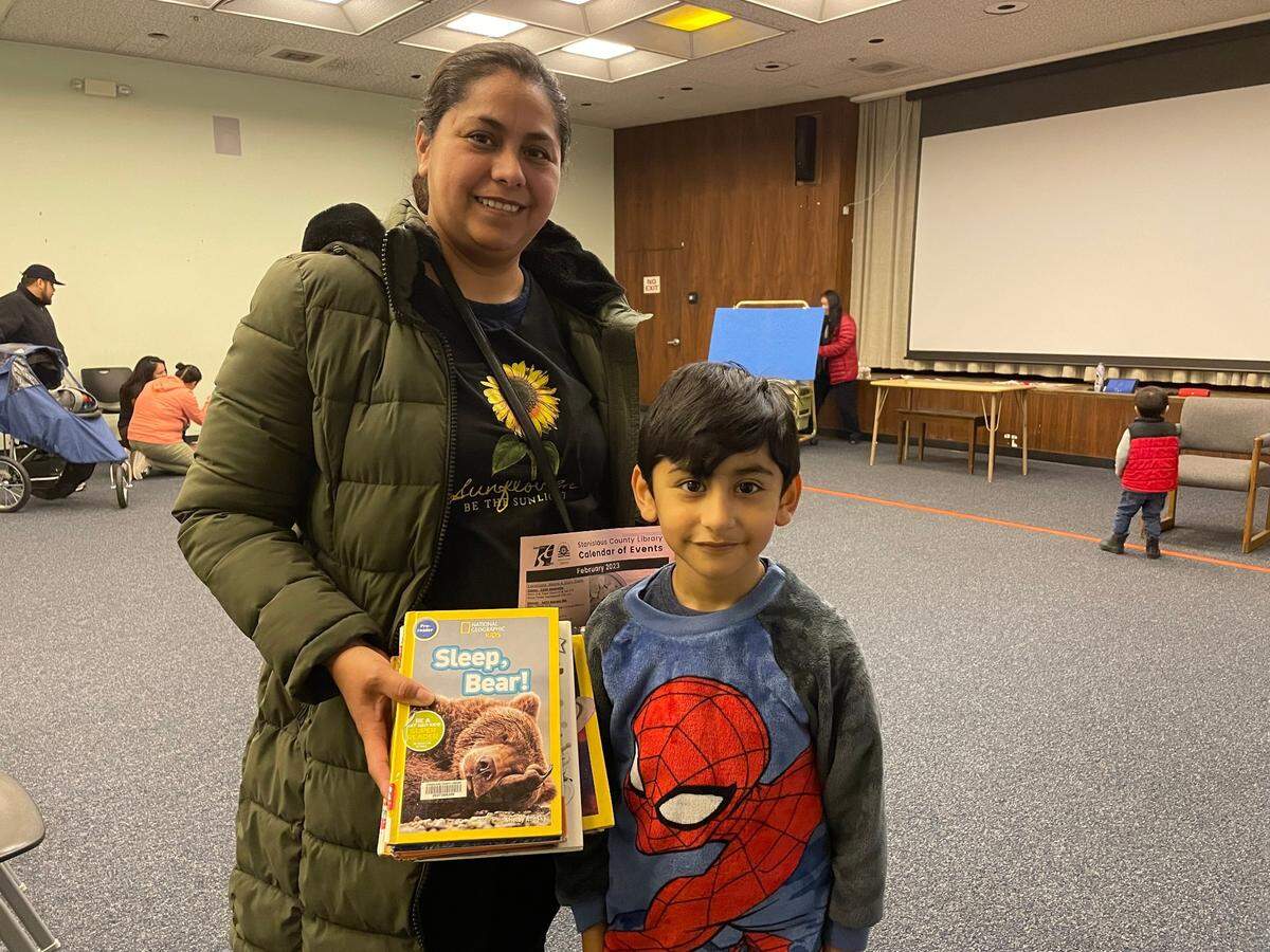 Angelica Sanchez has struggled to find Spanish-language books that her son, Asher, likes. Less than 5% of the Stanislaus County library’s physical collection is in Spanish. Photographed January 26, 2023.