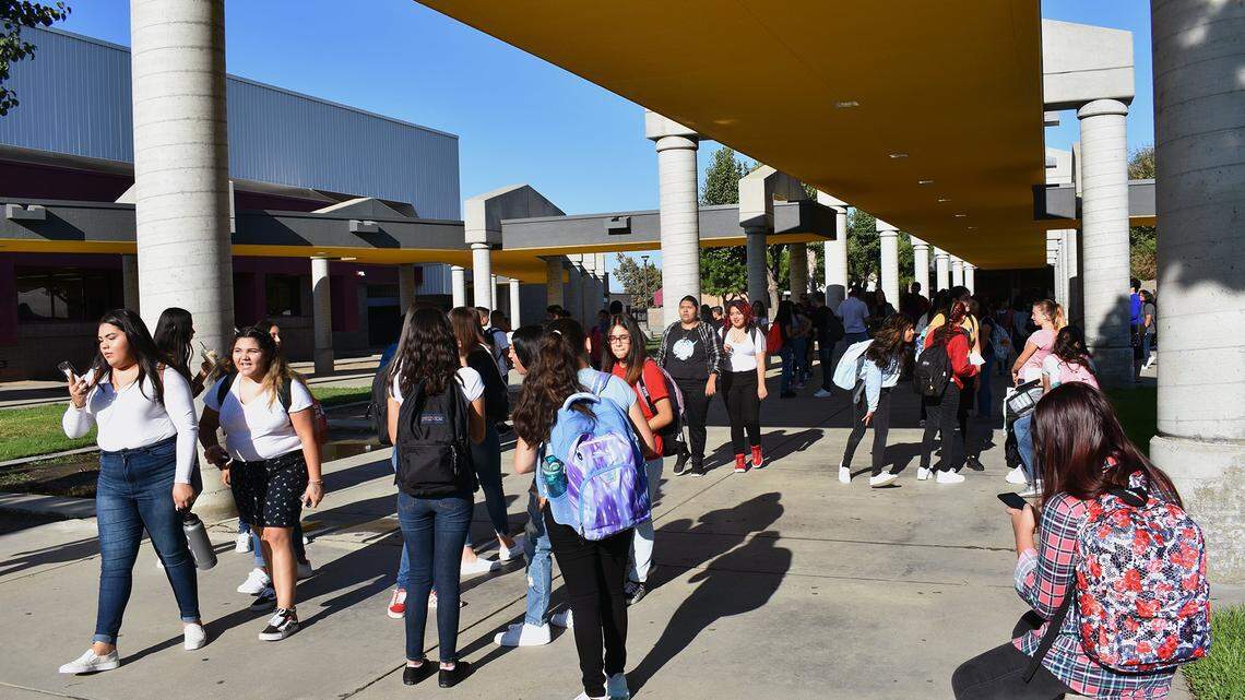 Students enjoy free time before classes start at Hanshaw Middle School on Monday, Aug. 12, 2019 in Modesto, Calif.