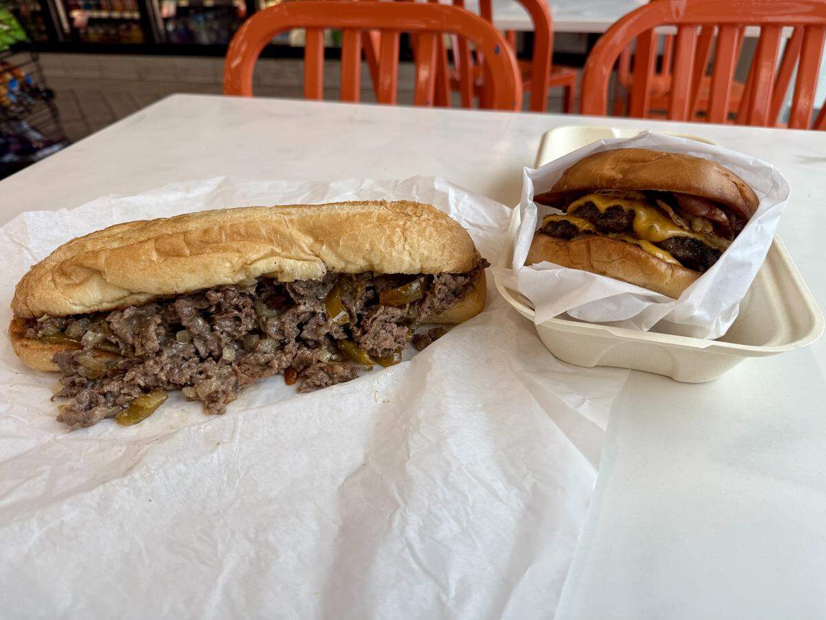 An OG Factory Philly and a barbecue bacon smash burger from Cheesesteak & Burger Factory in Modesto