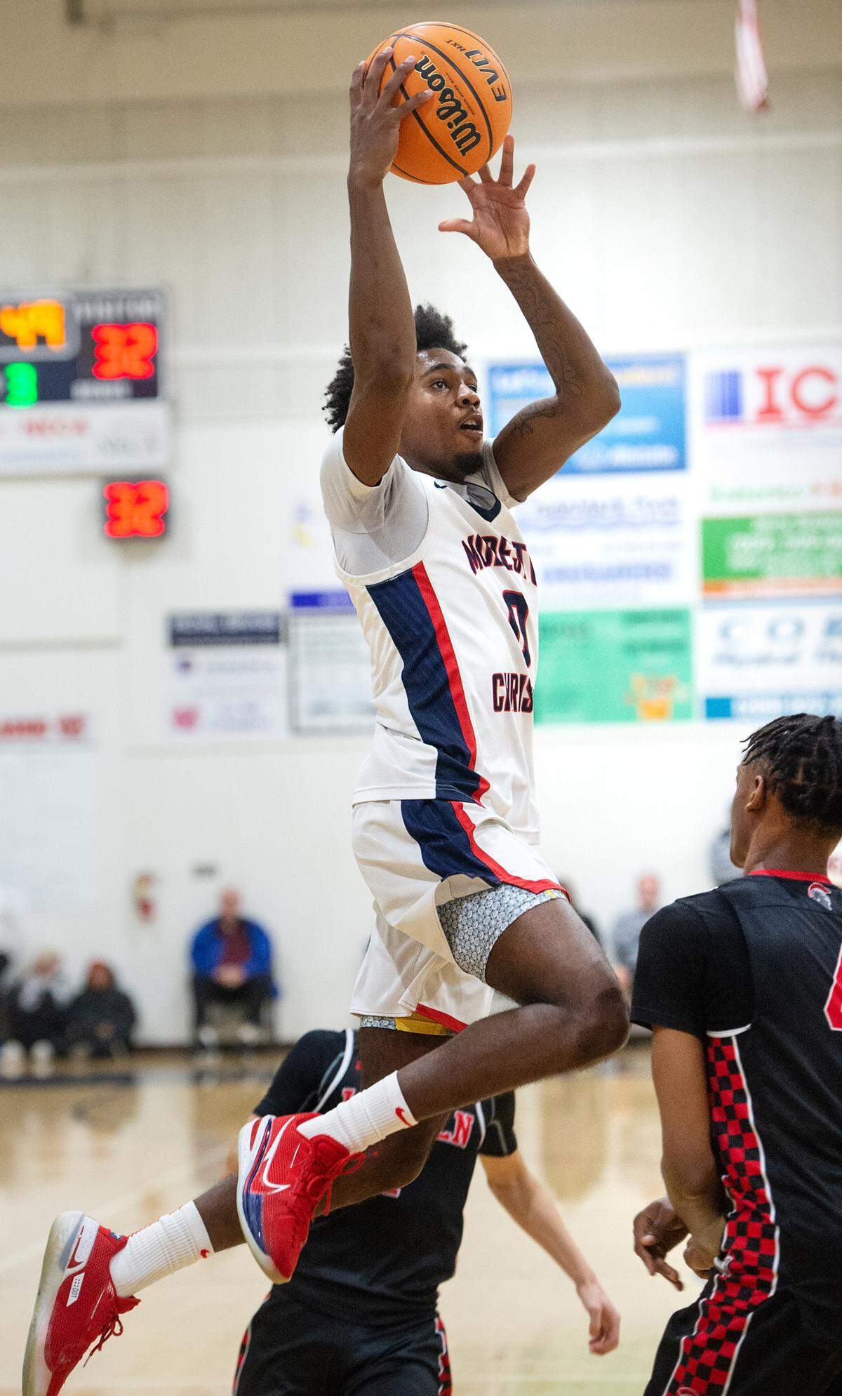 Modesto Christian’s Jalen Brown scores on a layup during the Sac-Joaquin Section Division I playoff game with Lincoln at Modesto Christian High School in Salida, Calif., Friday, Feb. 17, 2023.