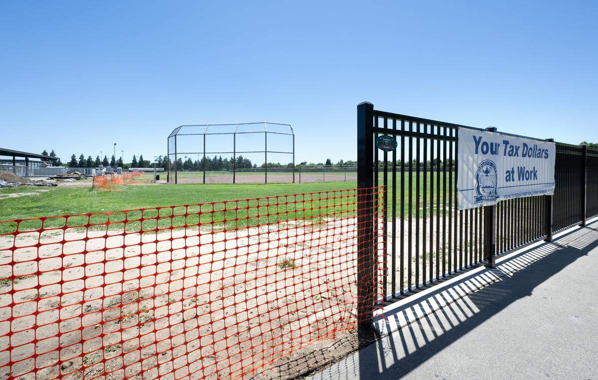 Perimeter fencing is being installed at Grace Davis High School in Modesto, Calif., Tuesday, June 04, 2024.
