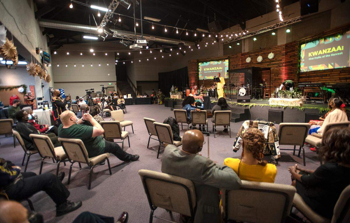 Michael Baldwin speaks during the Modesto-Stanislaus NAACP Holiday Kwanzaa Social at Redeemer Modesto in Modesto, Calif., on Friday, Dec. 10, 2021.