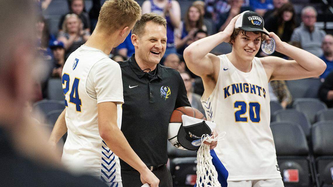 Ripon Christian coach Mark Hofman, middle, is all smiles with his players Jacob Van Groningen, left, and Braden Van Groningen, right, after his team beat Stockton Christian 73-56 for the Sac-Joaquin Section Division VI boys basketball championship at the Golden 1 Center in Sacramento, Calif., on Thursday, Feb. 27, 2020.