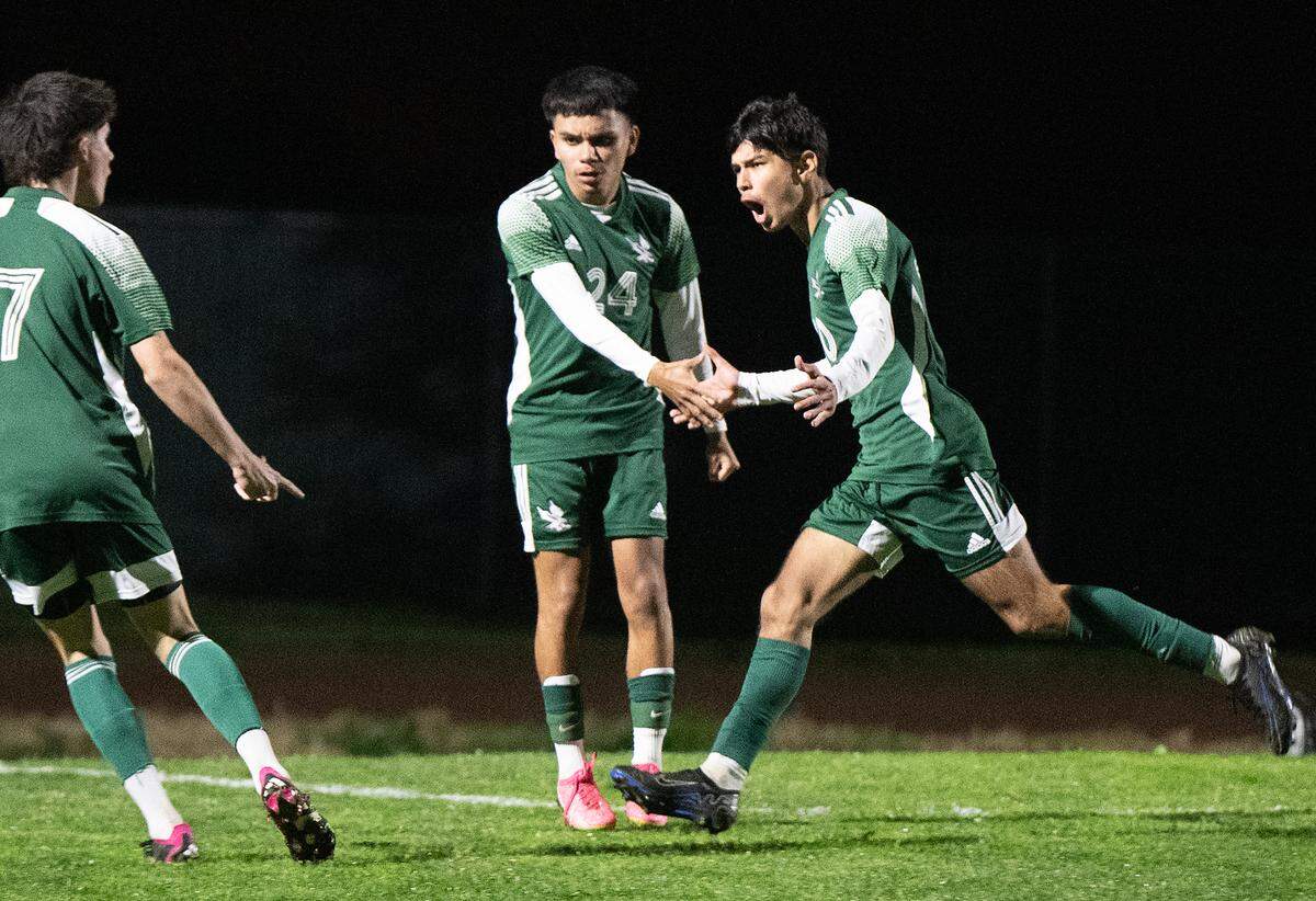 Central Valley’s Alejandro Garcia, right, celebrates a goal with teammates Victor Macias (24) and Omar Alvarez (7) during the Central California Conference game with Golden Valley at Central Valley High School in Ceres, Calif., Tuesday, Jan. 16, 2024.