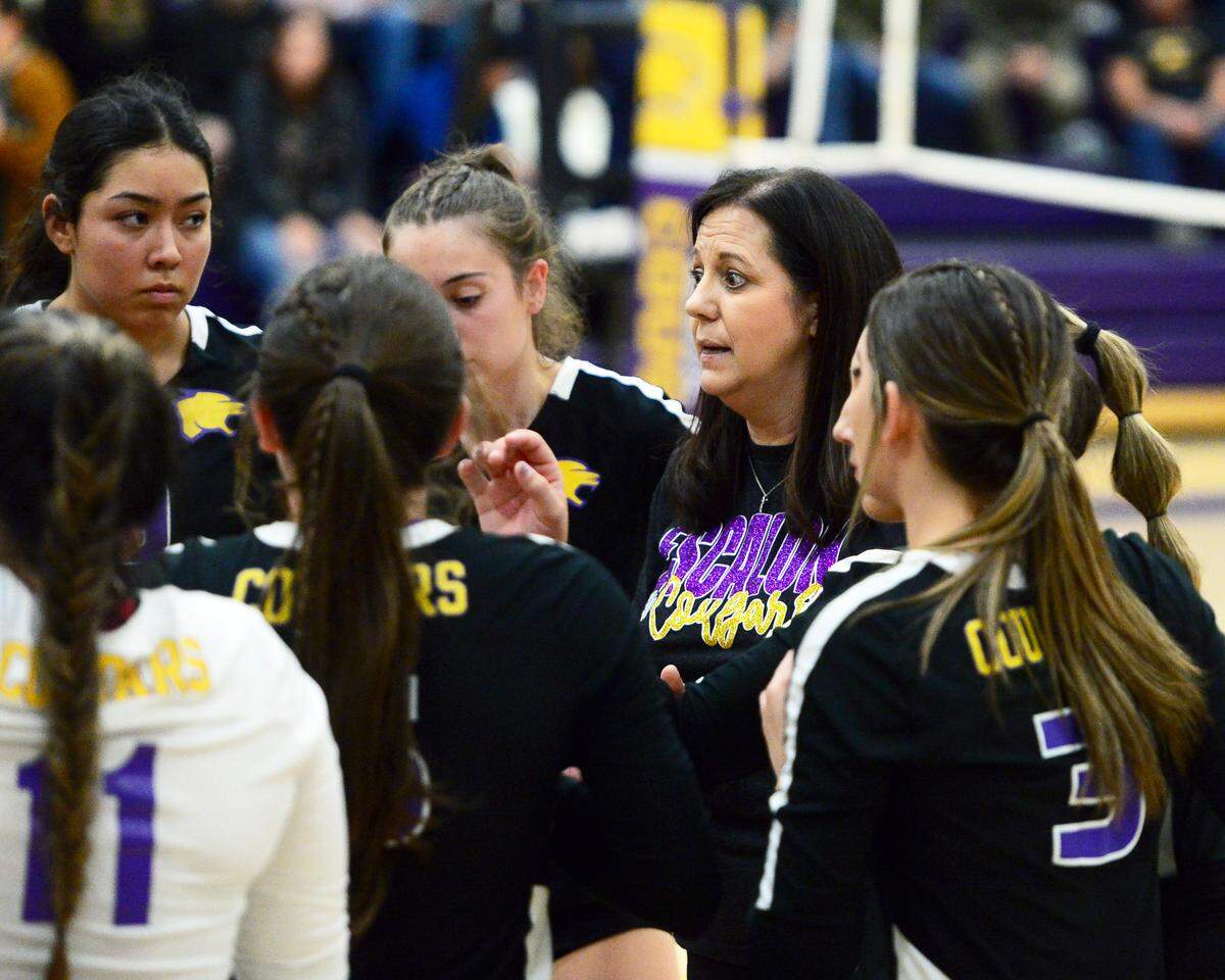 Escalon’s Head Coach Teresa Williamson talks to her team during a CIF San-Joaquin Division III Girls Volleyball Playoffs game between Escalon High School and Ponderosa High School at Escalon High School in Escalon CA on November 1, 2022. Escalon won the match 3-2.