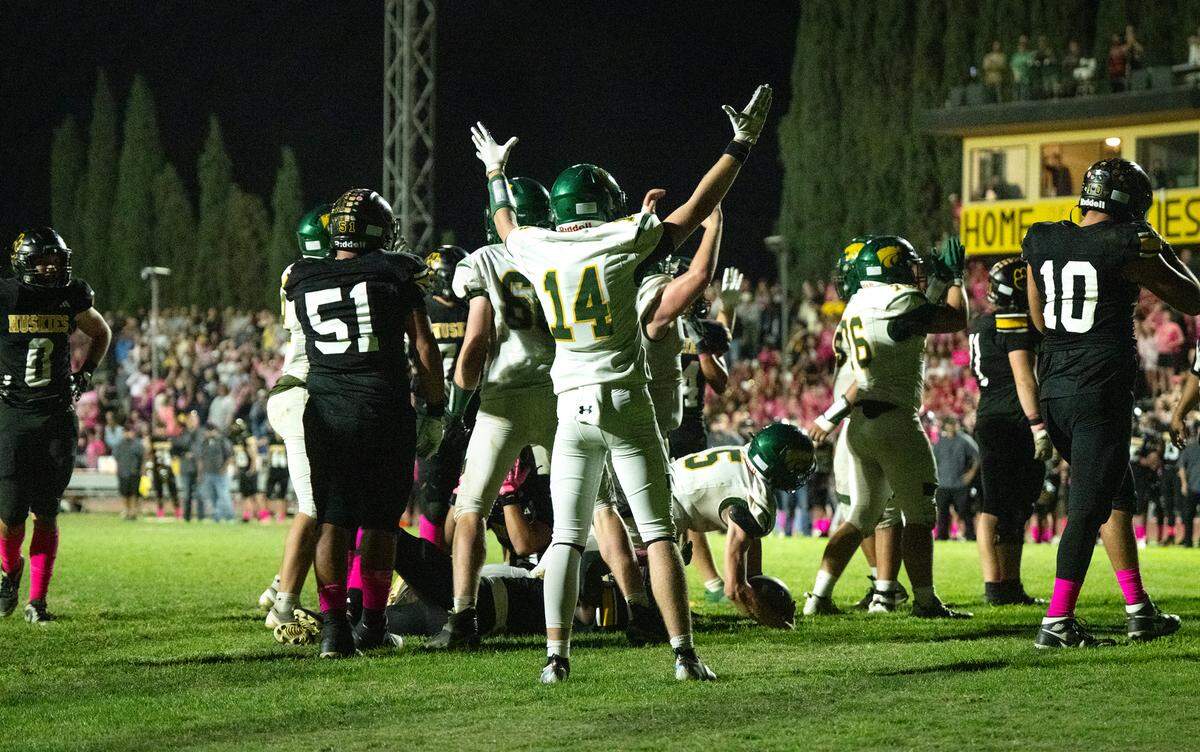 With Hughson ahead 52-45 and just 10 seconds left in the game, Sonora quarterback Eli Ingalls rumbled through the line for a seven-yard touchdown during the Trans Valley League game with Sonora in Hughson, Friday, Oct. 11, 2024. Sonora lost after they failed to convert on a two-point conversion.