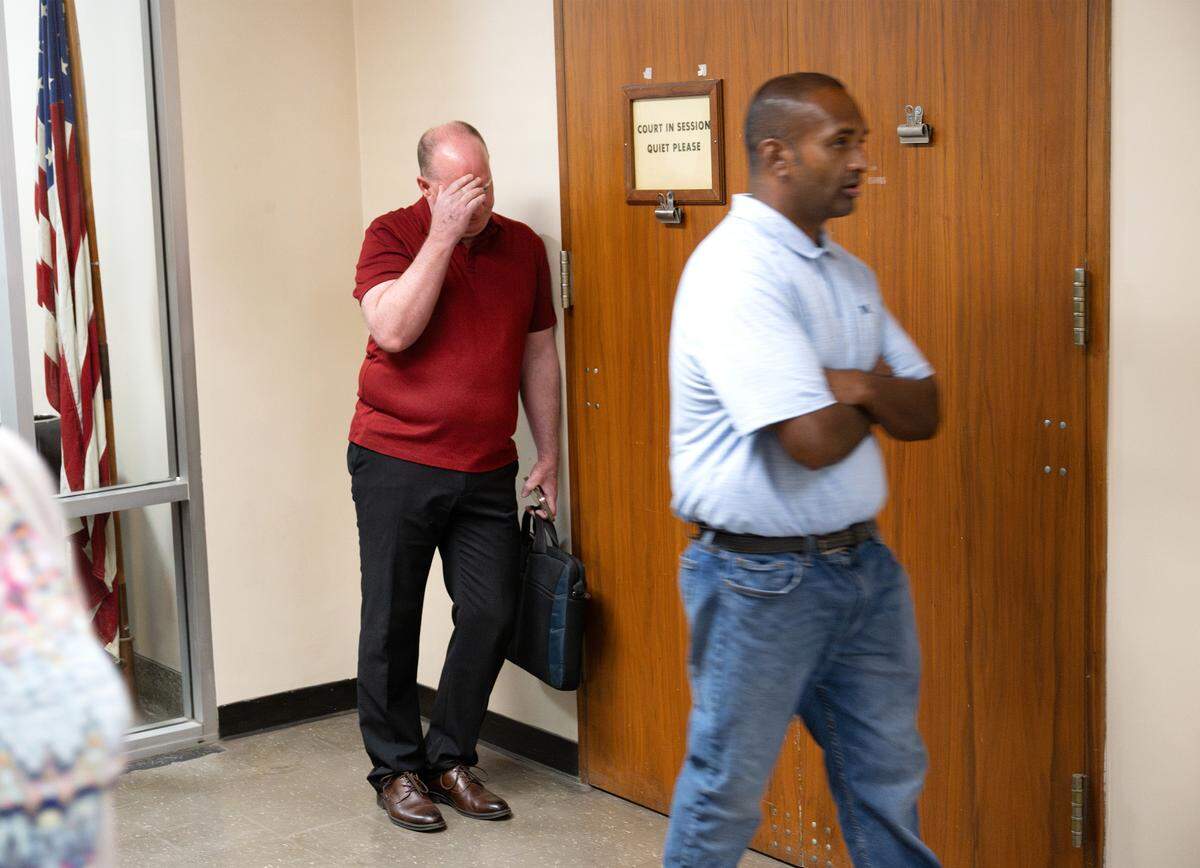 James Hooker waits outside Stanislaus Superior Court Department 3 before a hearing in Modesto on  Tuesday, Aug. 26, 2025. Hooker faces child pornography charges.