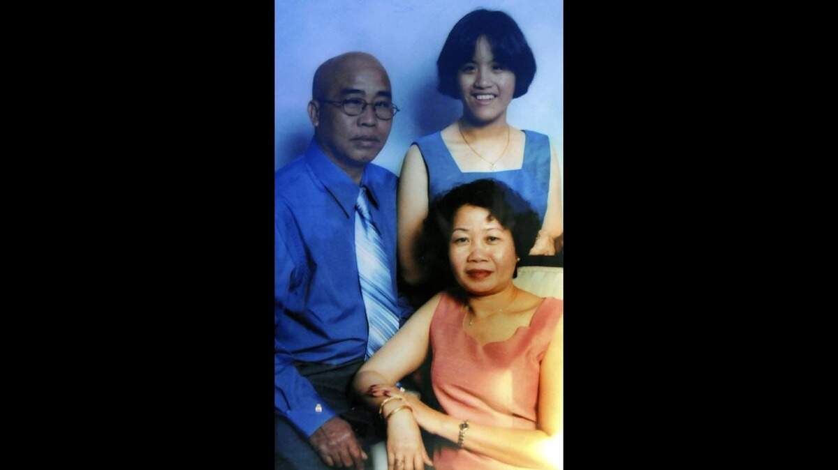 Vanh and Phouvieng Thammavongsa and their daughter, Nanci, are pictured in this family portrait