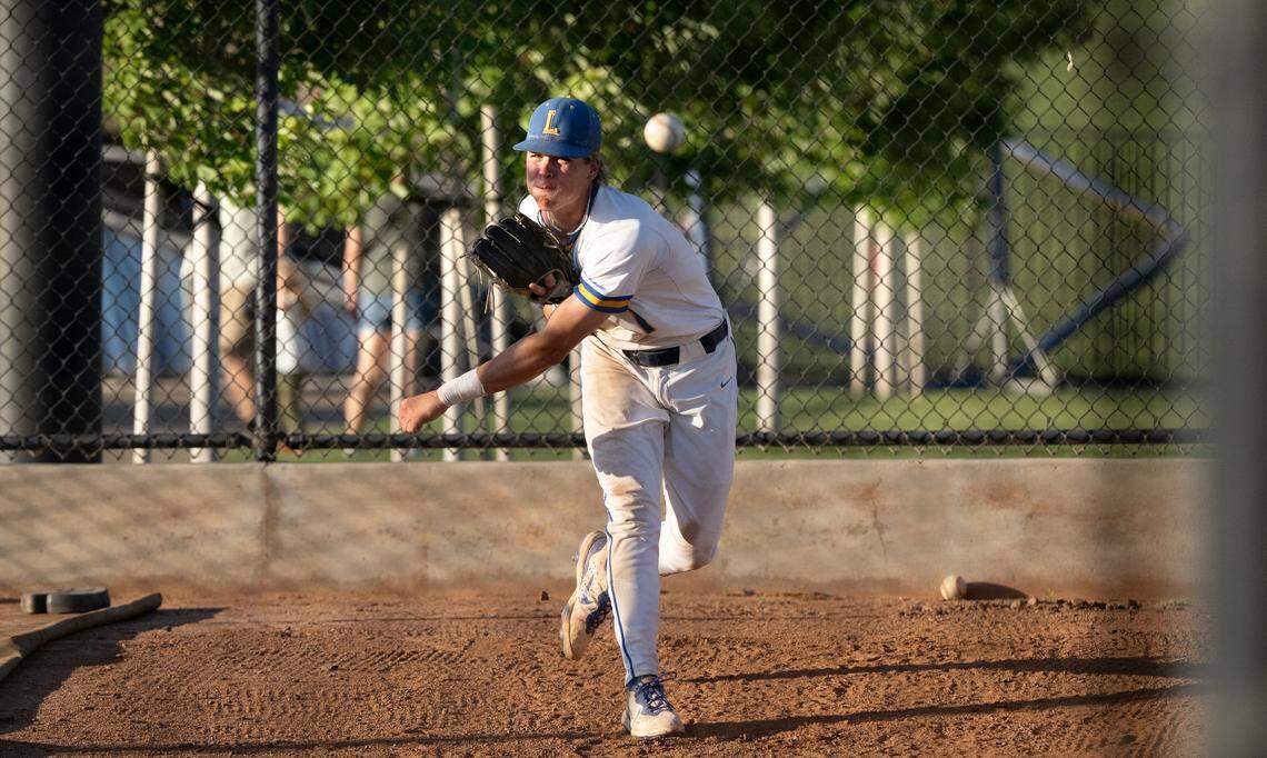 Lincoln’s Landyn Plaut throws in the bullpen during the Sac-Joaquin Section D-V championship game at Islander’s Field in Lathrop, Wednesday, May 21, 2025. Plaut came in as a reliever and recorded the save.