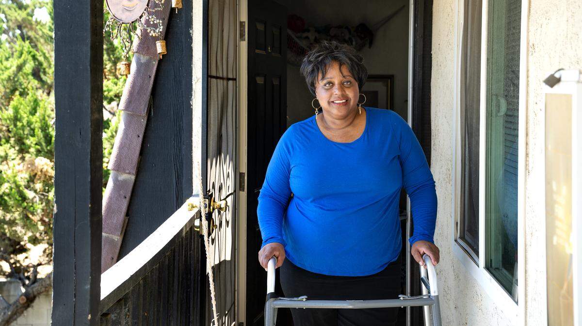 Shantel Johnson outside her apartment in Modesto on Friday, June 13, 2025. Johnson said she tries to maintain a positive attitude despite being dismissed from a Stanislaus State master’s program. Johnson is also recovering from foot surgery.