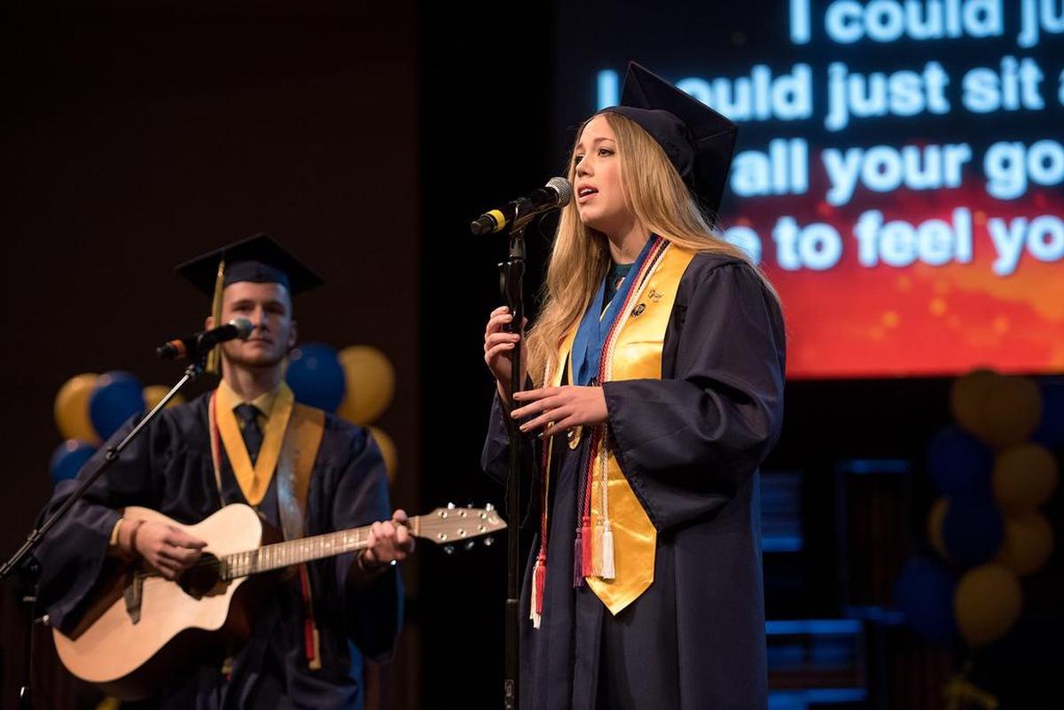 Stephanie McClure, right, and Alec Butler perform during the Big Valley Christian School graduation ceremony at Big Valley Grace Community Church in Modesto, Calif., Friday, June 1, 2018. McClure will attend Grand Canyon University and Bulter will attend Liberty University.