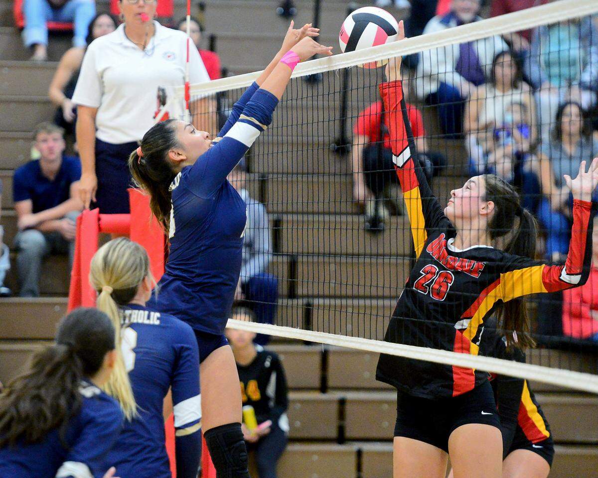 Central Catholic’s Czyleah Pabustan hits the ball past Oakdale’s Jaedyn Riley during a game between Oakdale and Central Catholic at Oakdale High School in Oakdale, Calif. on Thursday, Oct. 17, 2024.&nbsp;