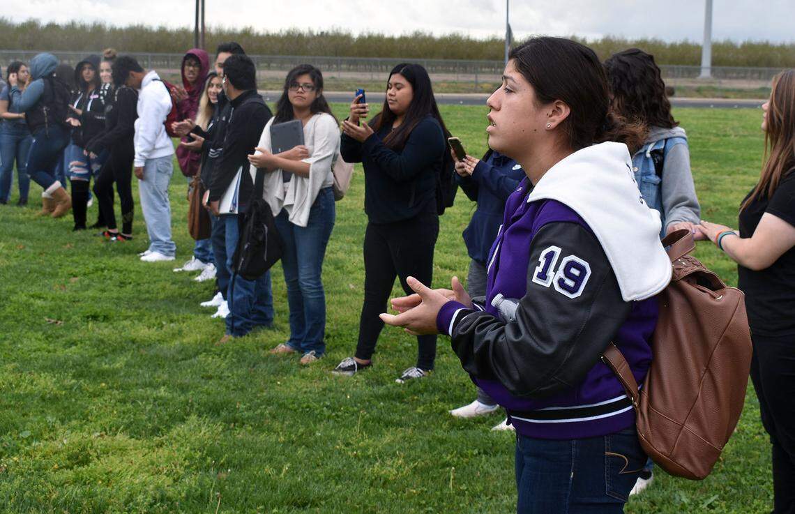 At Johansen High School in Modesto, an estimated 200-plus students -- about 20 percent of the student body, the principal said --  took part in the Enough: National School Walkout on March 14, 2018. Here, one of the organizers, junior class President Alicia Lugo, talks to her fellow students.