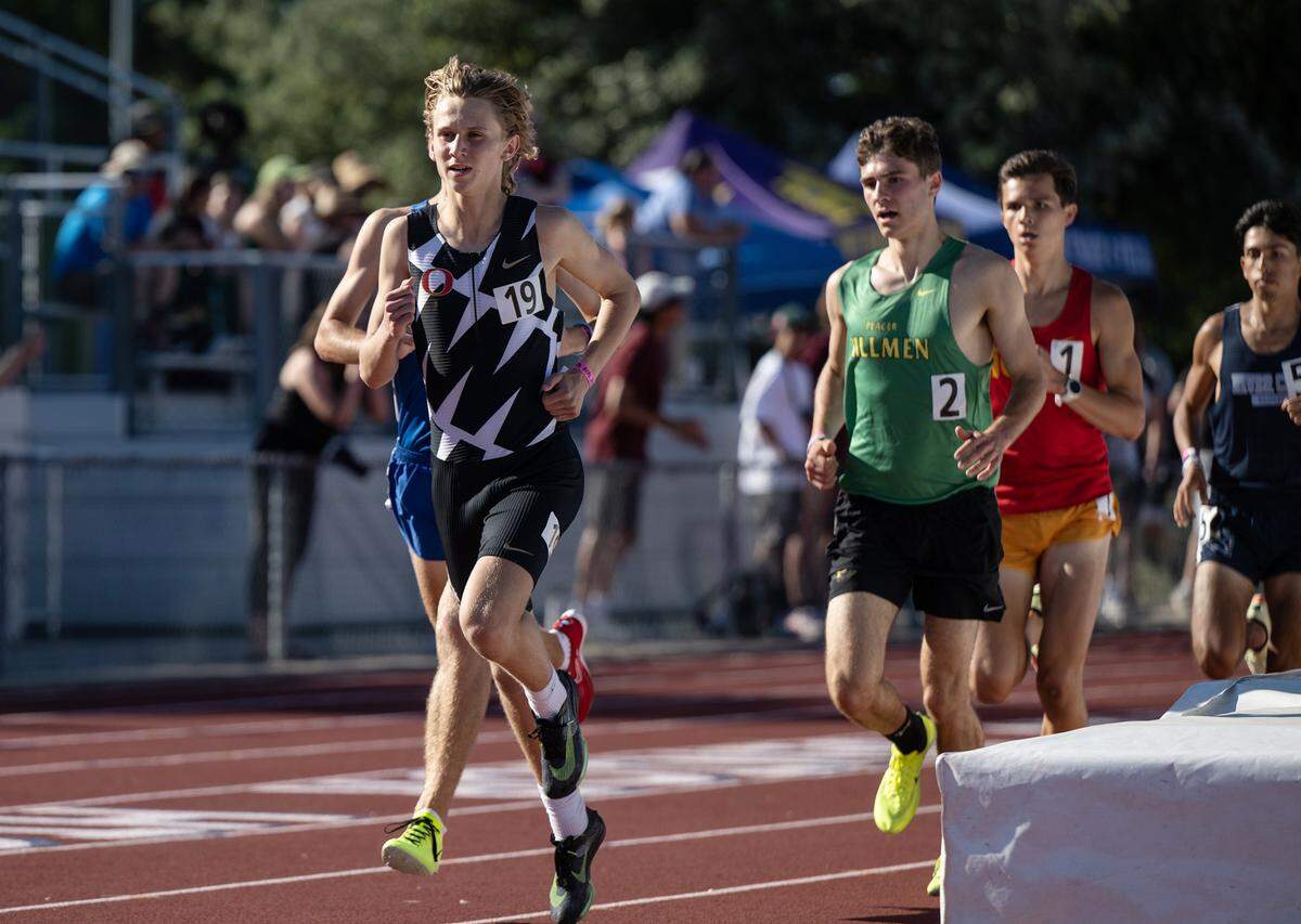 Oakdale’s Caleb Cavanaugh placed second in the 1600 meter race with a time of 4:15.21 in the CIF Sac-Joaquin Section Masters track finals at Davis High School in Davis, Calif., Saturday, May 20, 2023.