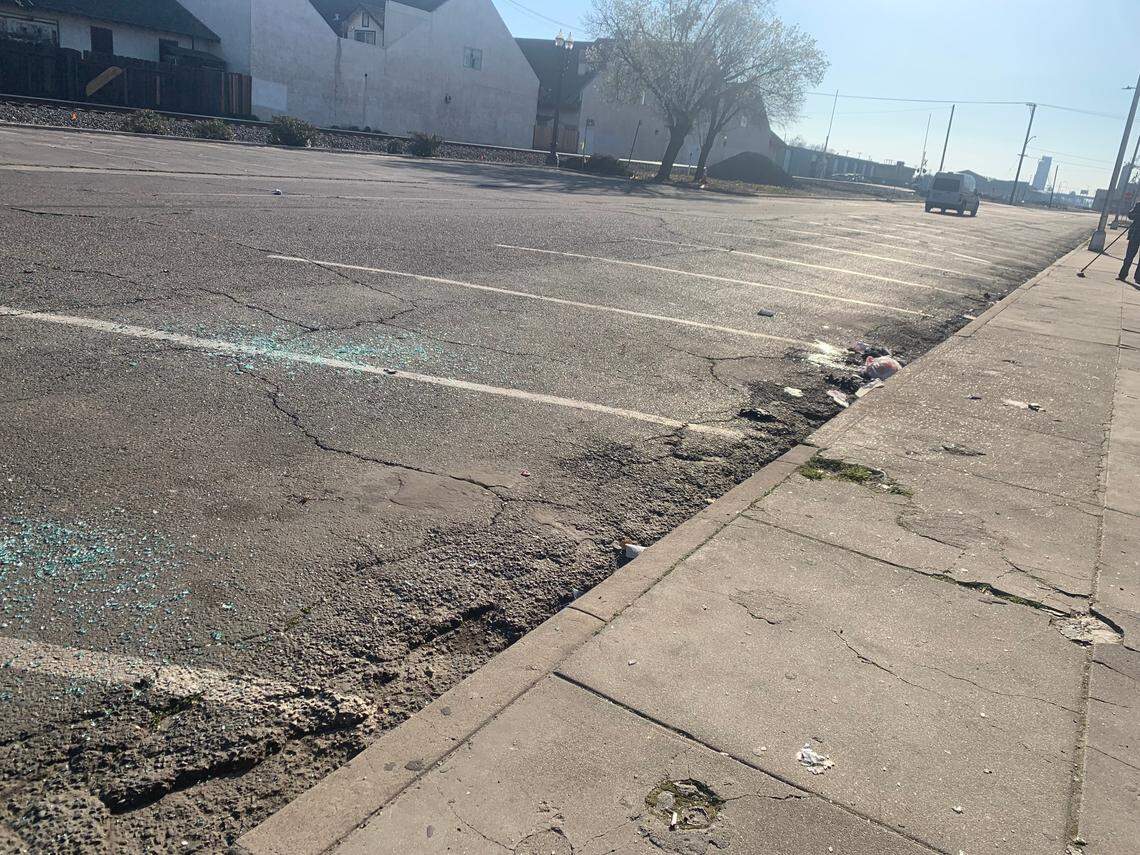 Broken glass littered the scene where seven people were shot in downtown Turlock early Saturday. Feb. 19, 2022
