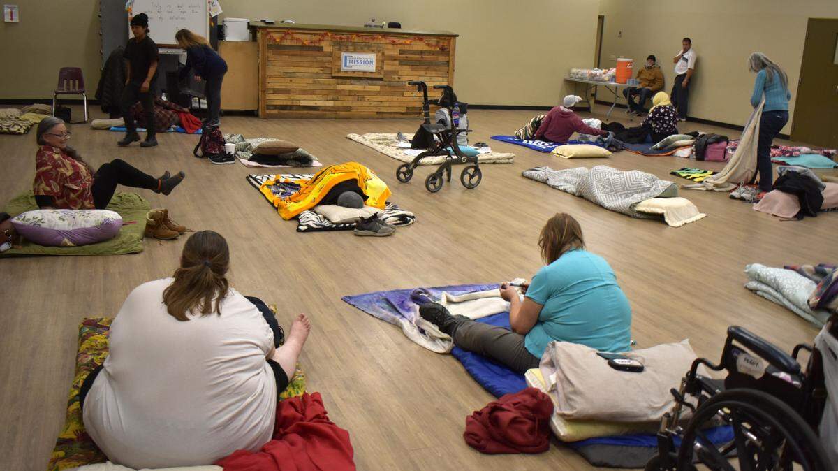 Women settle in for the night at the Modesto Gospel Mission on Yosemite Boulevard on Thursday, Nov. 9, 2023.