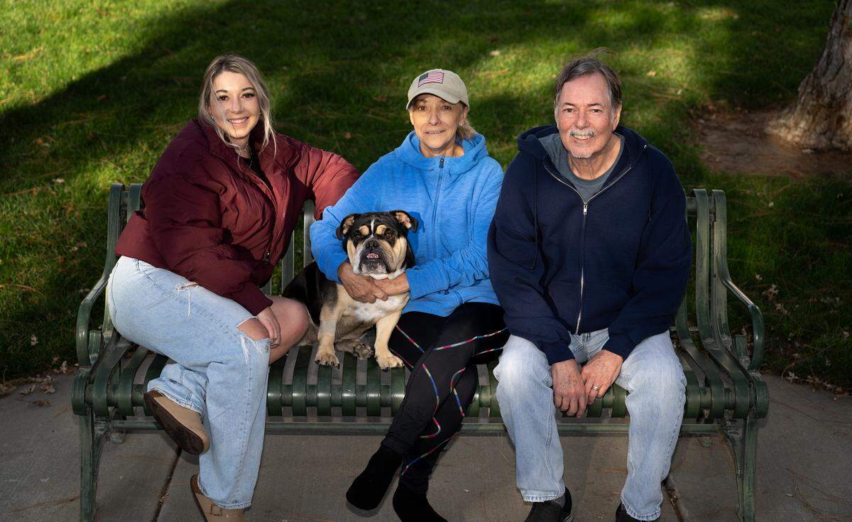 Lisa Haas, left, and her parents Claudia and Eric Haas with Lisa’s English bulldog Mia. Mia has been voted Modesto’s cutest dog.