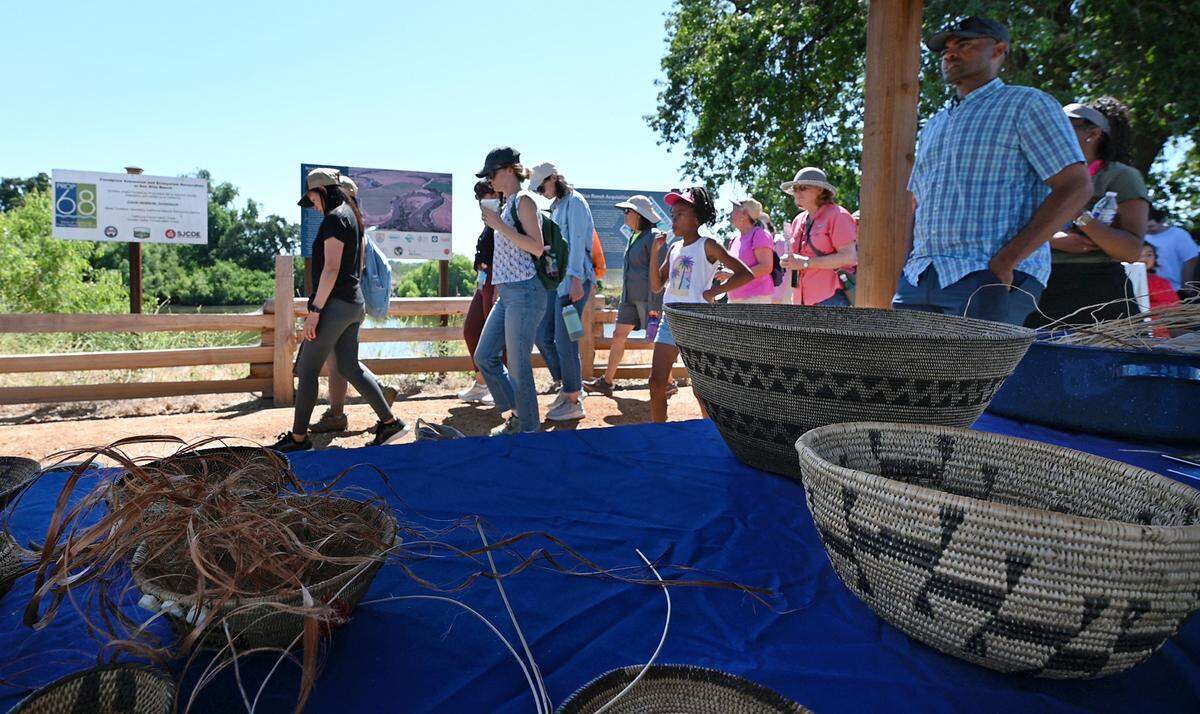 Guests start a walking tour at the newly opened Dos Rios State Park in Modesto, Calif., Wednesday June 12, 2024.