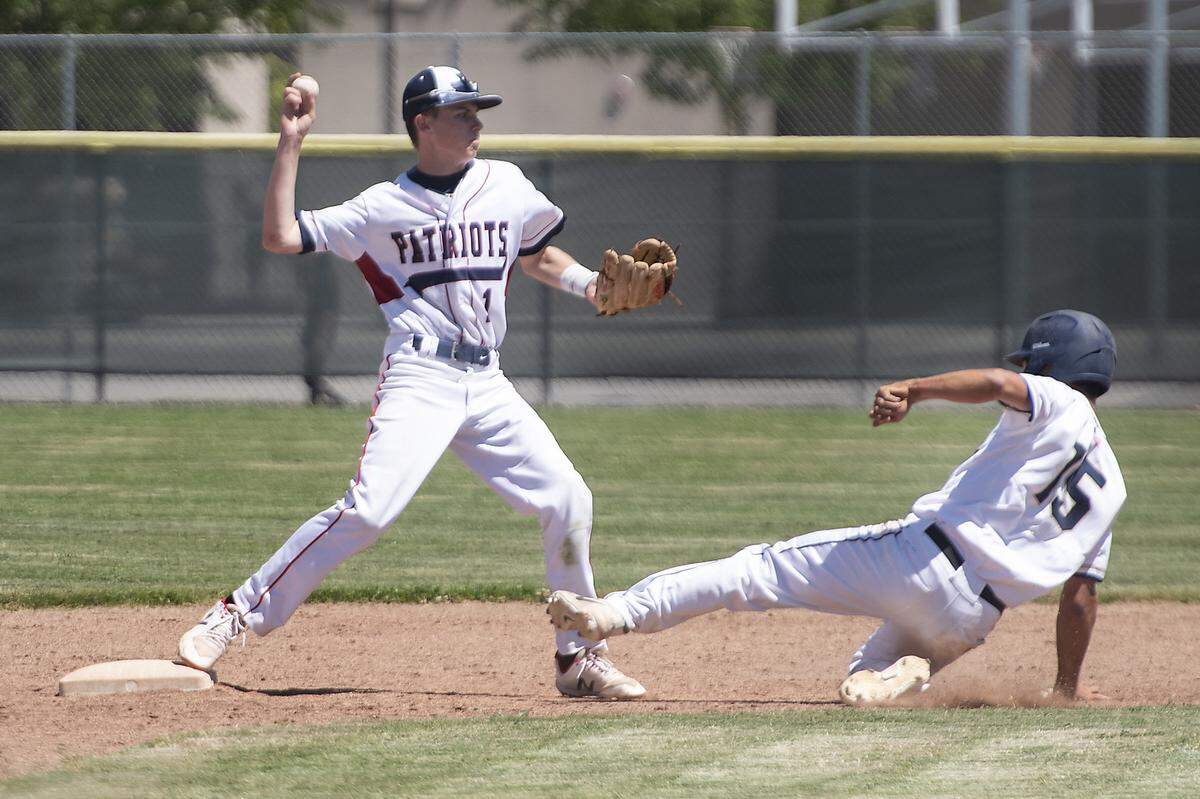 Central Catholic’s Matt Akulow is forced out by Beyer’s Logan Tomlinson during the Mark Dickens Tournament at Gregori High School in Salida, Calif., Tuesday, April 23, 2019. 