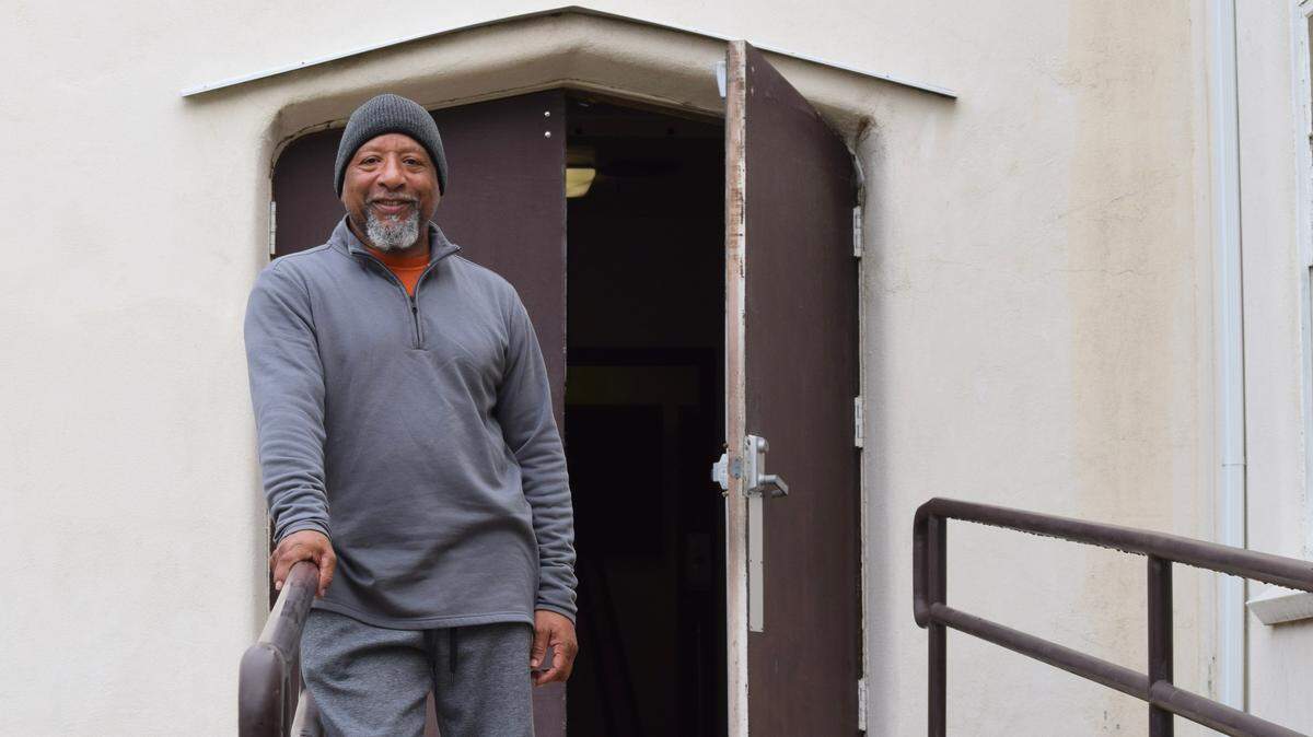 Leon Callen, a minister at Christian Love Baptist Church, 202 H St., Modesto, stands in front of the church door on October 22, 2021.