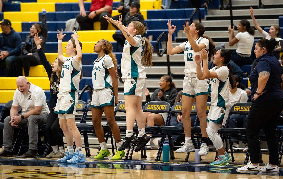 Members of the Gregori girls basketball celebrate after a made three pointer during a CCAL game against Turlock at Gregori High School in Modesto, Calif. on Thursday, Jan. 30, 2025.