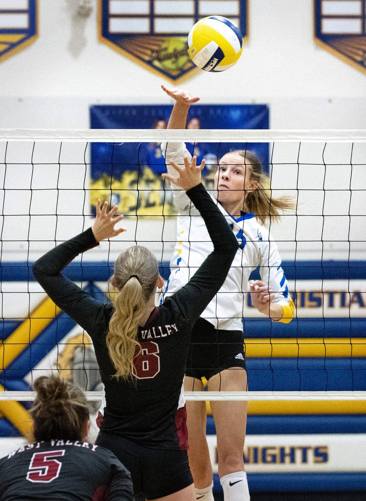 Ripon Christian’s Haley Kootstra strikes the ball past West Valley defender Kelsey Morton during the CIF State Division 4 playoff game at Ripon Christian High School in Ripon, Tuesday, Nov. 12, 2024.