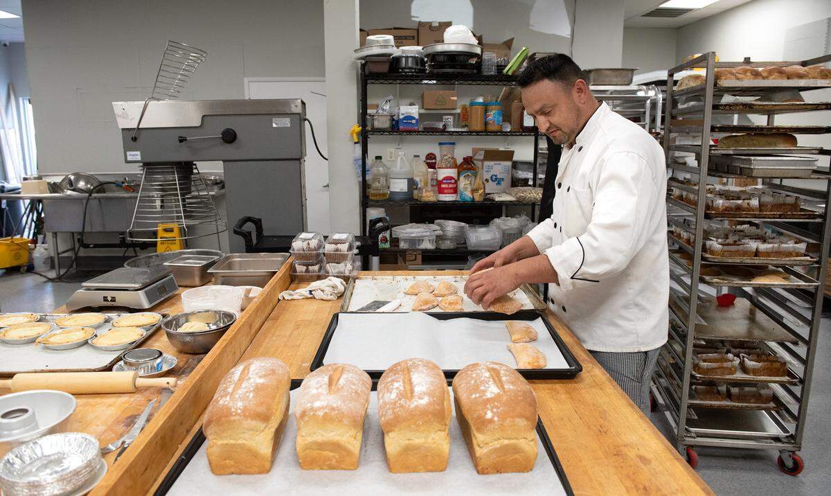 Bakery chef Moises Pimemtel works on multiple projects in the bakery at El Bistro by Salt and Pepper in Modesto, Calif., Thursday, April 13, 2023.