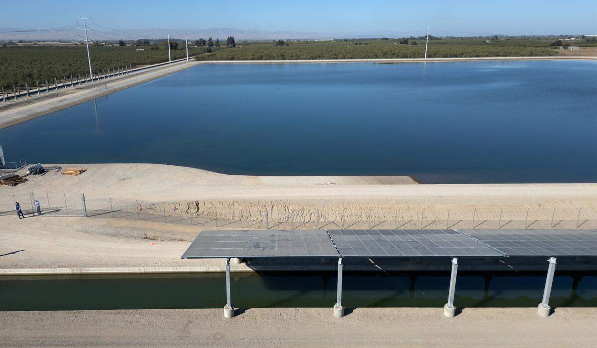 Project Nexus, a Turlock Irrigation District pilot project using solar using solar arrays to cover two TID canals is under construction southwest of Keyes, Thursday, Oct. 17, 2024.