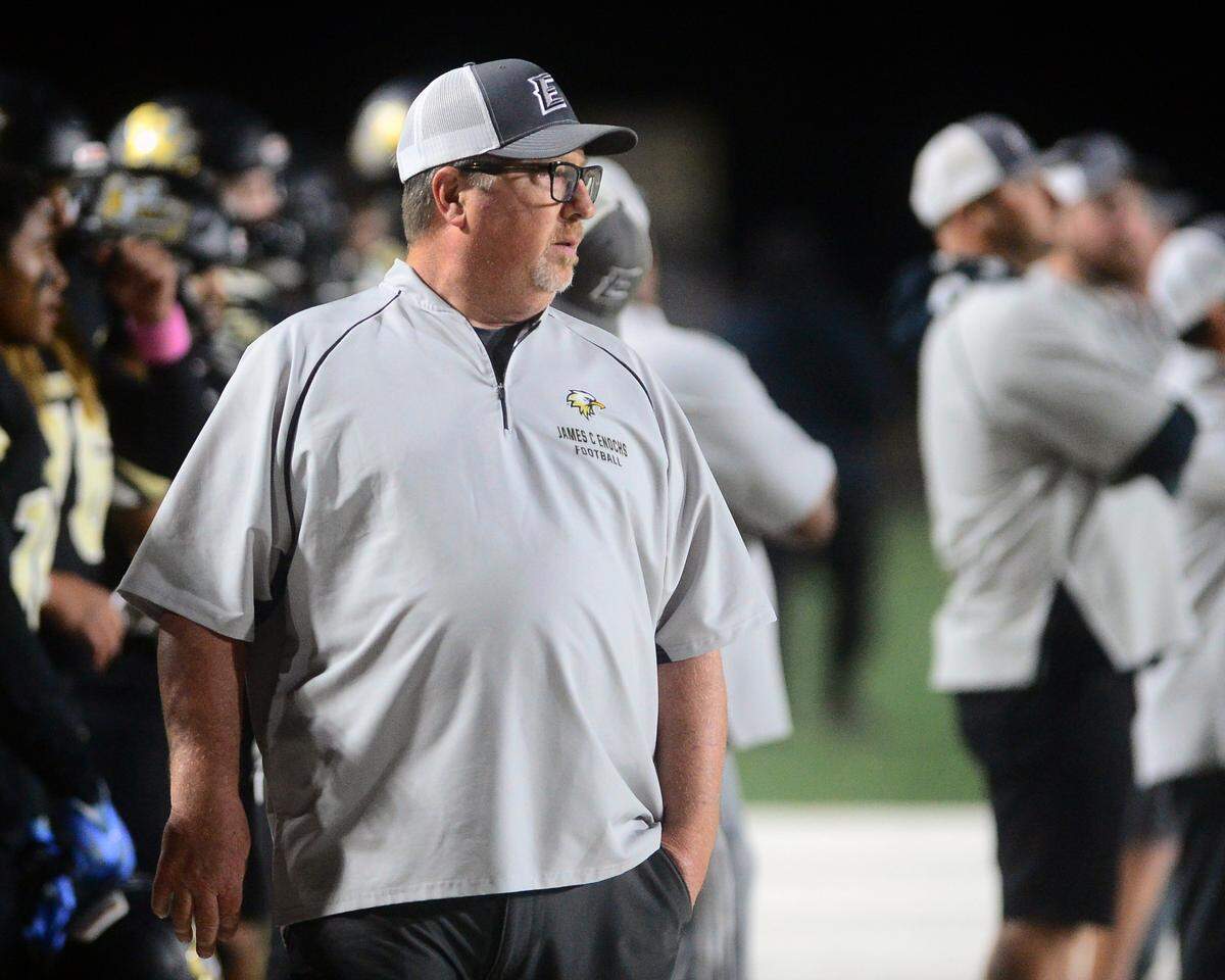 Enoch High coach Tracey Traub walks the sidelines during a game against Modesto at Johansen High School in Modesto, Calif., on Oct. 28, 2022.