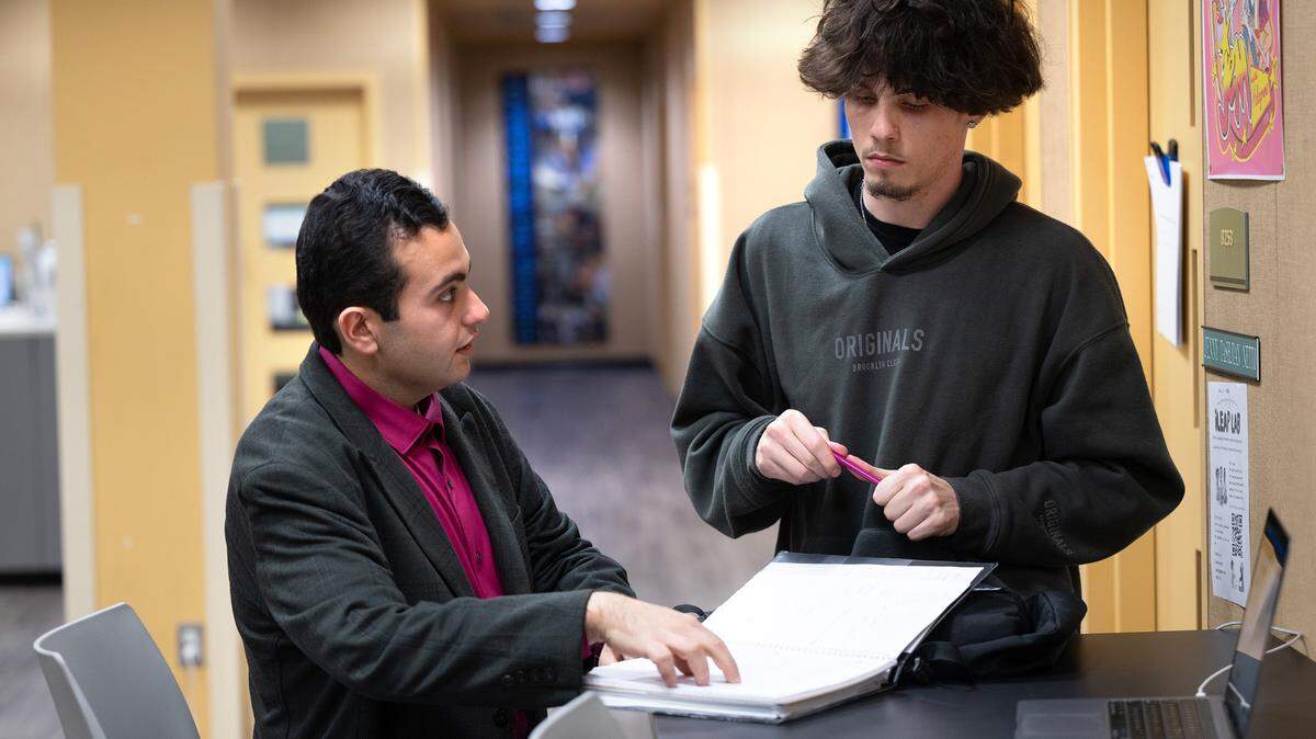 Mathematics professor Andrew Lazar tutors Noah Vandenburg in calculus at Modesto Junior College in Modesto, Calif., Wednesday, Feb. 7, 2024.