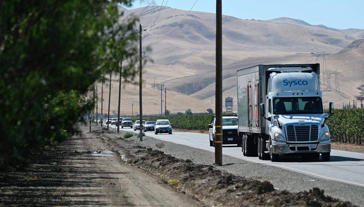 Traffic on Howard Road in Westley, Calif., on August 24, 2022.