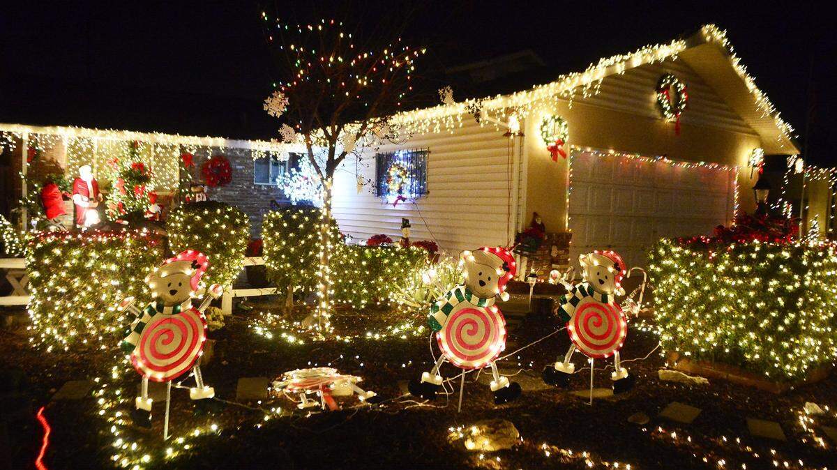 In this file photo, a home is decorated with a festive display of lights at Christmas Tree Lane in Ceres.