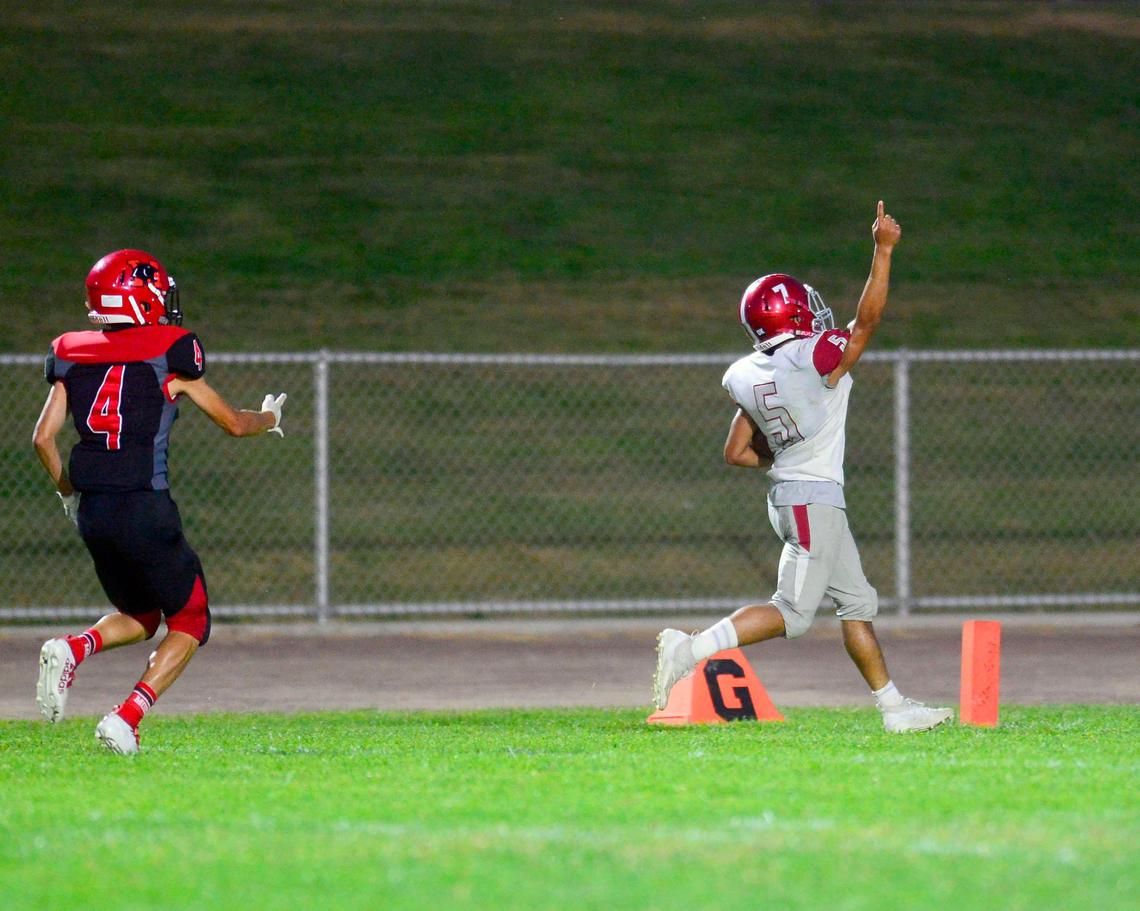 Patterson running back Obadiah Godbolt (5) celebrates while scoring a touchdown during a game between Modesto High School and Patterson High School at Gregori High School in Modesto California on September 13, 2019.