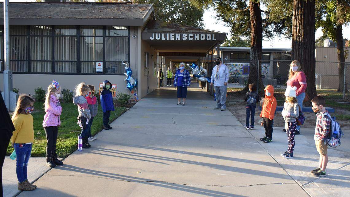 Students line up to be led to their classrooms at Julien School in the Turlock Unified School District on Monday morning, Oct. 26, 2020. TUSD welcomed transitional kindergartners and kindergartners back to in-person learning.