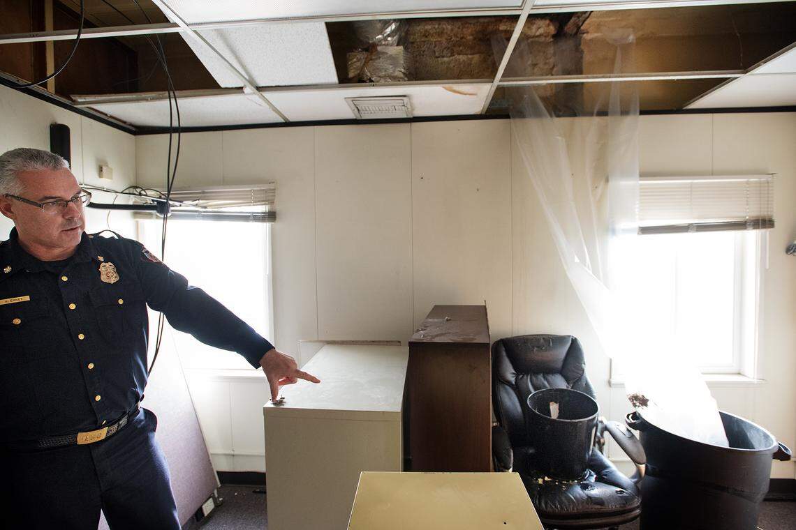 Modesto Fire Chief Alan Ernst points out some of the water damage that has forced them to vacate two offices at Modesto Fire Station 1 in Modesto, Calif., Thursday, Jan. 17, 2019.